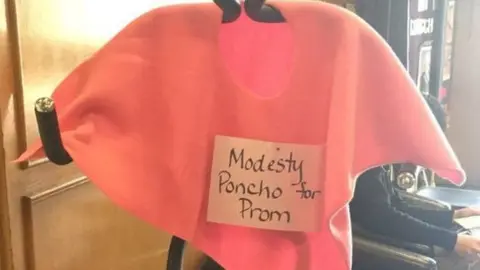 @lmiles179 Image of a pink poncho