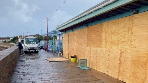 The Lookout Beach Cafe Cafe boarded up