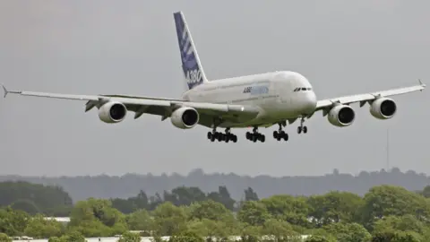 Getty Images An Airbus A380 coming in to land at Heathrow Airport