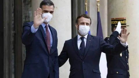 EPA French President Emmanuel Macron (R) greets Spanish Prime Minister Pedro Sanchez (L)