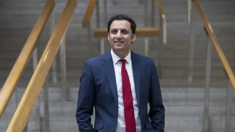 PA Media Anas Sarwar