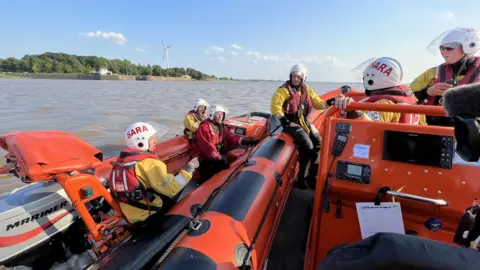 Sara crew manning two search and rescue boats