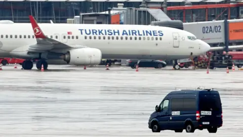 Police secure the apron at Hamburg airport