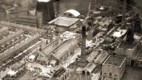 Easington Colliery Heritage Group View of the pit and crowds in the street after the disaster