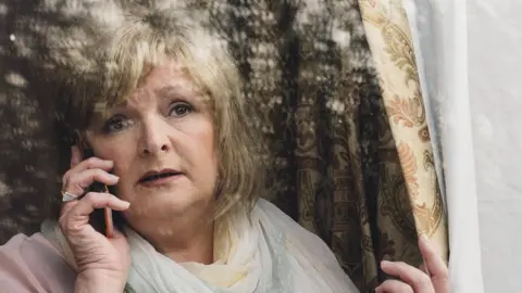 Getty Images Woman on phone