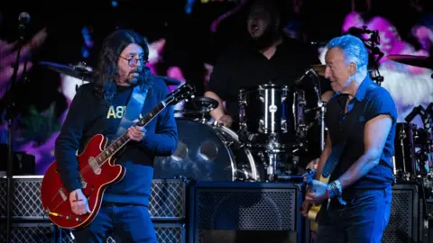 Getty Images Dave Grohl and Bruce Springsteen