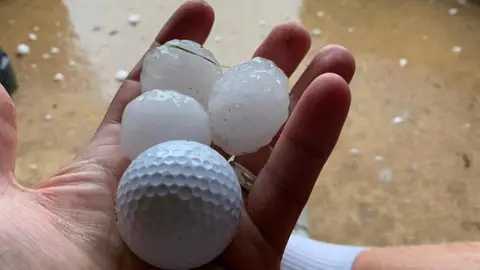 Ross Greaves Golf ball next to hail