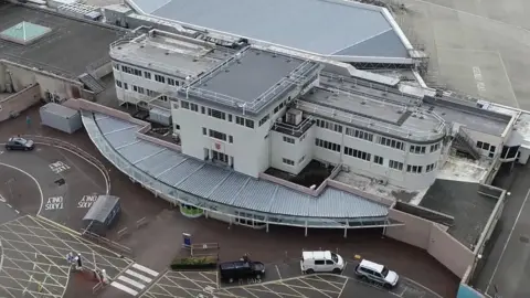 Jersey airport reopens after snow closes runway