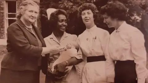 Other Daphne Steele (second left) with Mary Walsh (left) matron of the Doris Court nursing home in Manchester, who encouraged Daphne to apply for St Winifred's matron role
