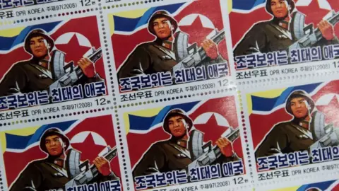 Getty Images Military-themed stamps displayed at a shop in central Pyongyang. North Korea. November 2017