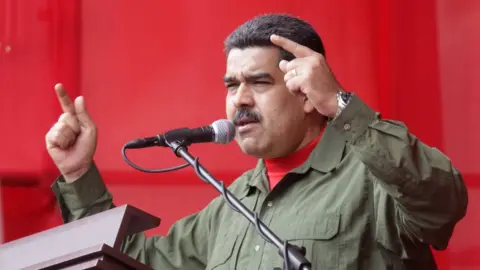 EPA Venezuelan President Nicolas Maduro speaking during a ceremony of the Bolivarian National Armed Forces (FANB) in Caracas, Venezuela