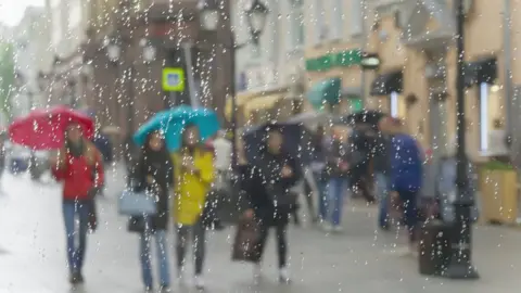 Getty Images Rain outside a window