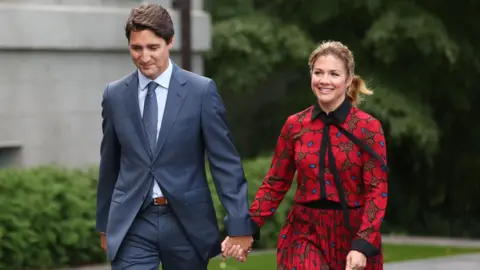 AFP Prime Minister Justin Trudeau and his wife, Sophie Gregoire, arrive at Rideau Hall