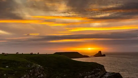 Richard Moult Sunset over Worms Head by Richard Moult