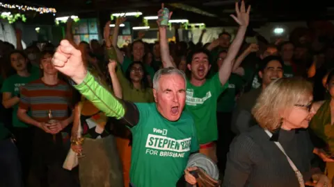 Getty Images Greens supporters cheer