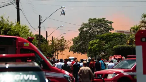 AFP/Getty Police at the scene of the shooting