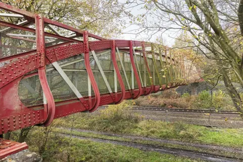 Historic England Archive Deep Pit railway footbridge in Hindley, Wigan