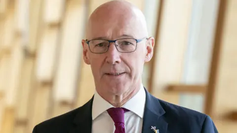 PA Media John Swinney