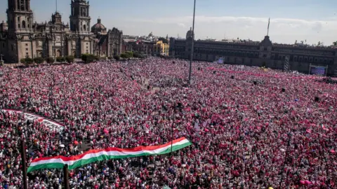 AFP via Getty Images Protesters on Mexico City's historic Zocalo Square, Mexico. Photo: 26 February 2023