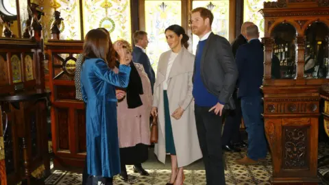 PA Prince Harry and Ms Markle arrive at the Crown Bar in Belfast