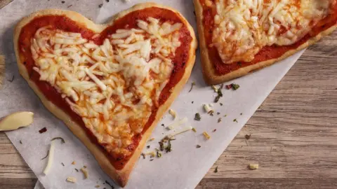 Getty Images Pizza in the shape of a heart