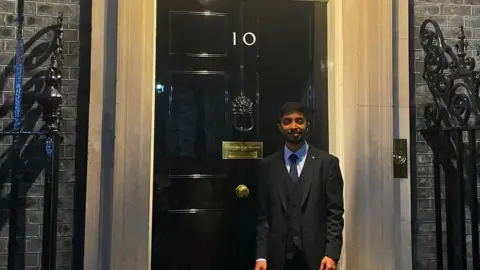 Vivek Gurav Vivek standing outside 10 Downing Street