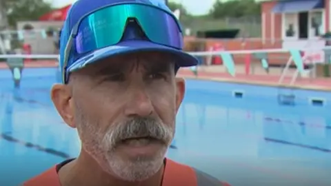 BBC Shaun Crowley, managing director of Beccles Lido, standing in front of the pool