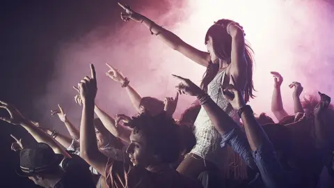 Getty Images Girl clubbing