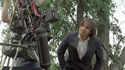 Alamy David O. Russell seen during one of the happier moments on the set of I Heart Huckabees