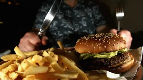 Getty Images burger and chips on plate