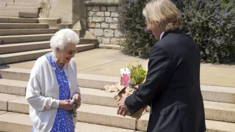 PA Media Queen Elizabeth II receives a Duke of Edinburgh rose, given to her by Keith Weed, President of the Royal Horticultural Society,, at Windsor Castle, Berkshire.