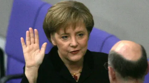 AFP Angela Merkel was first sworn-in as chancellor in 2005