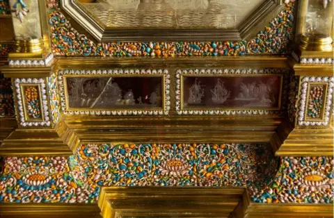 Antonio Olmos A close up of the decoration of rock crystal and enamel on the casket of an organ clock