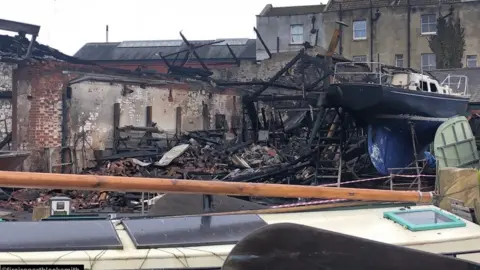 Fire Iron Blacksmith Photo of burnt down workshop