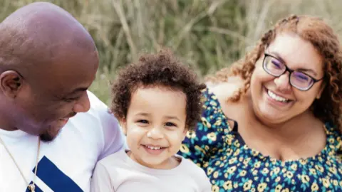 Contributed Shekiel with his parents