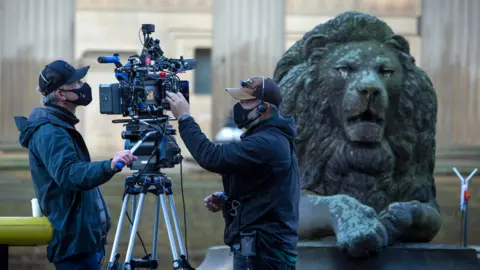 Getty Images Camera operators outside St George's Hall in Liverpool