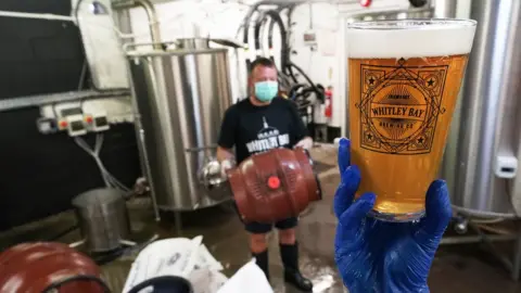 Photoshot Gary Harding checks a pint with Gavin Hattrick (left) from the Whitley Bay Brewing Company at The Brewery pub in Whitley Bay