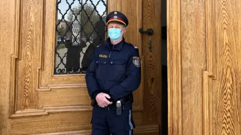 Police officer with mask