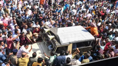 Arun Chandrabose An angry mob blocks a forest department vehicle during a hartal by various political parties following the death of Paul in an elephant attack.