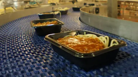 Getty Images Ready meals on a production line