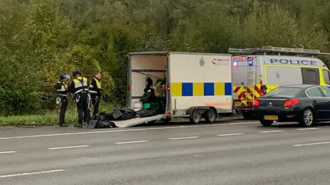 Surrey Police Police officers on the M25