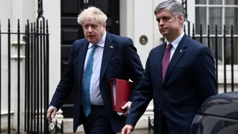 EPA Boris Johnson and Ukrainian Ambassador Vadym Prystaiko