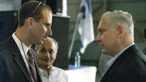George Birnbaum George Birnbaum stands opposite Benjamin Netanyahu