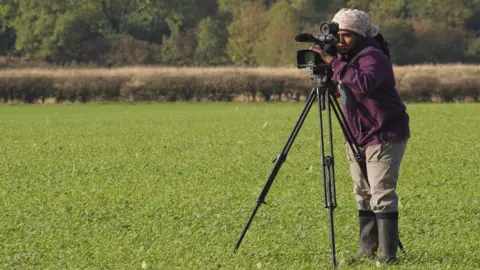 Hamza Yassin Photography Hamza at work outside