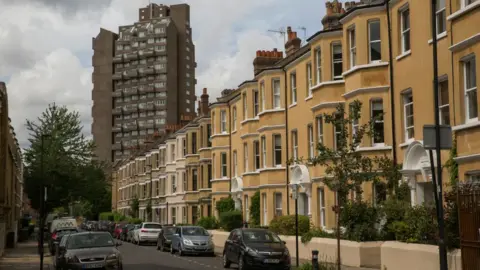 Sam Mellish Tower block and houses in London