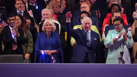 PA Media King Charles and Queen Camilla at concert