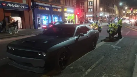 GMP car seized by police on motorbikes