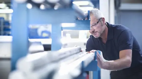 Getty Images Factory worker