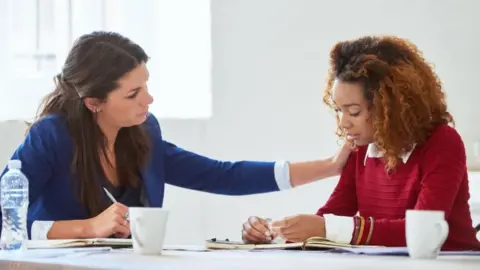 Getty Images Supportive Colleagues