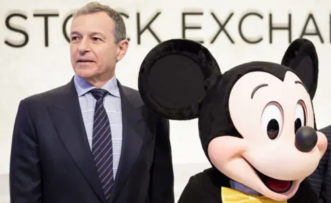 EPA Bob Iger with 'Mickey Mouse' in 2017